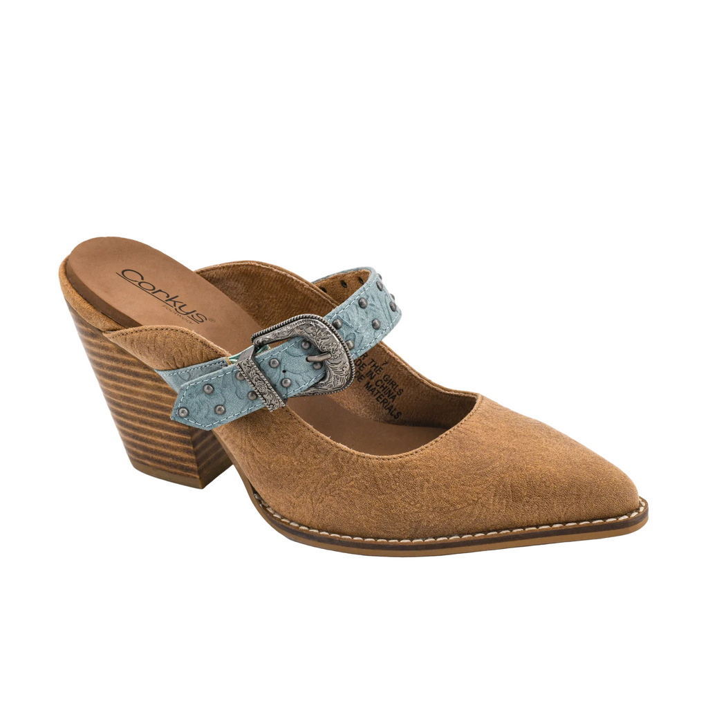 A single women's wedge mule shoe in tan suede with a light blue patterned strap and silver buckle, shown on a white background.