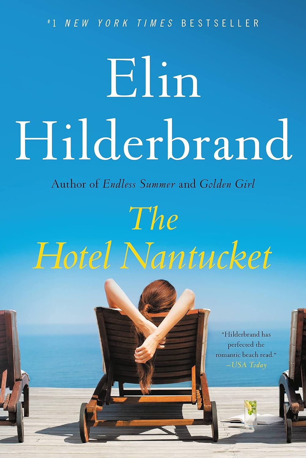 Book cover of 'The Hotel Nantucket' by Elin Hilderbrand with a woman on a beach chair.